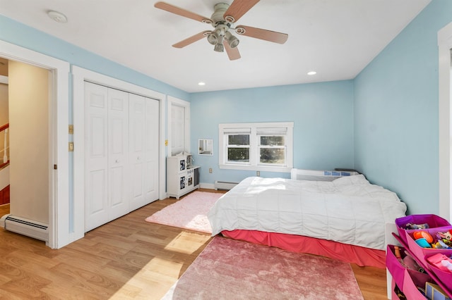 12 Wildwood Rd, Gilford, NH 03249 - bedroom with baseboard heating, a closet, light wood finished floors, and recessed lighting