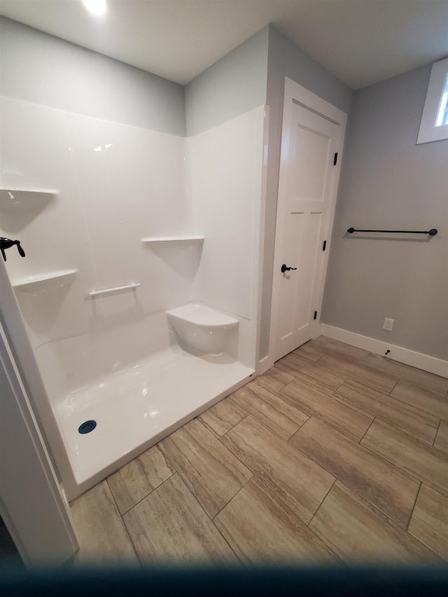 1761 US Route 2, East Montpelier, VT 05651 - full bath with walk in shower, baseboards, and wood tiled floor