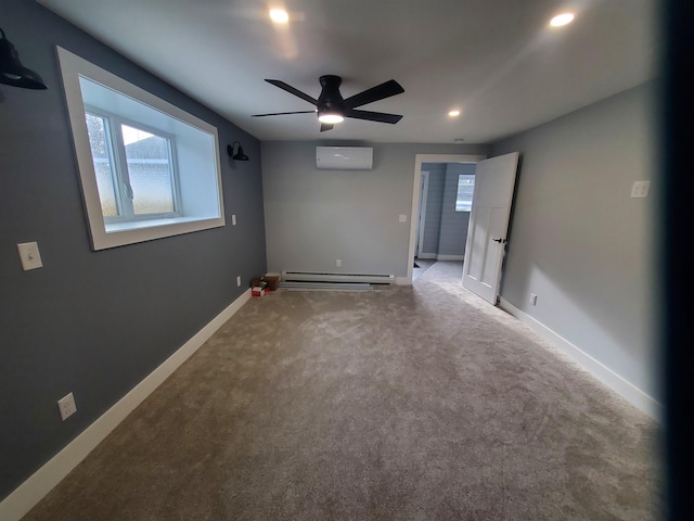 1761 US Route 2, East Montpelier, VT 05651 - carpeted spare room with a ceiling fan, plenty of natural light, a baseboard heating unit, and a wall mounted air conditioner