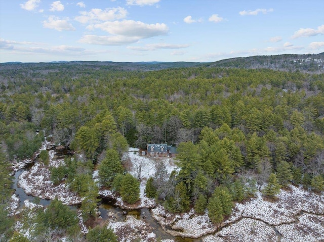 aerial view featuring a view of trees
