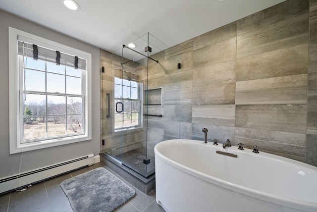 bathroom featuring a shower stall, recessed lighting, baseboard heating, tile walls, and a freestanding bath