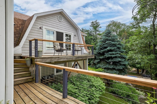 deck featuring stairs
