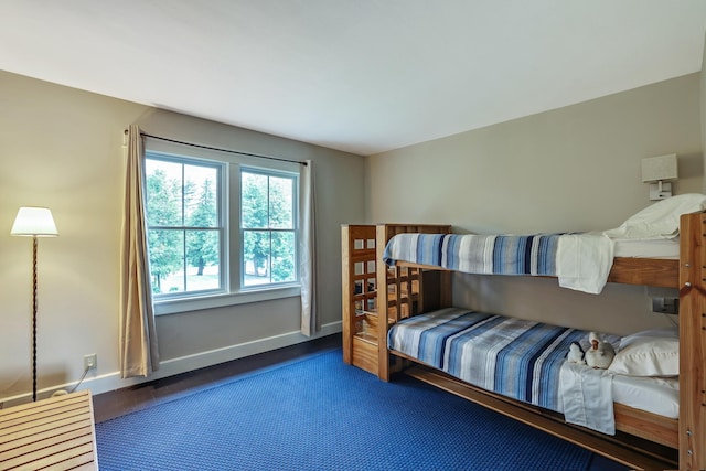 bedroom featuring baseboards