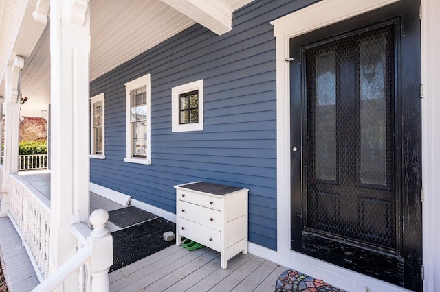 entrance to property with covered porch