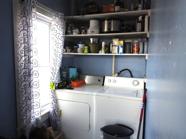washroom with washer and dryer and laundry area