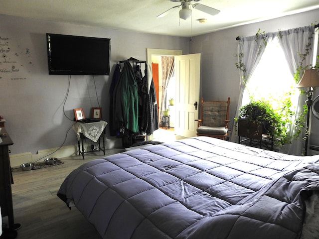 bedroom with wood finished floors