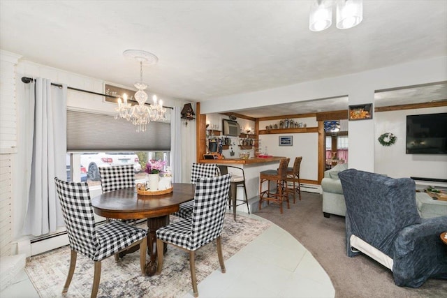117A Chases Grove Rd, Derry, NH 03038 - dining room featuring a baseboard radiator, a baseboard heating unit, and a notable chandelier