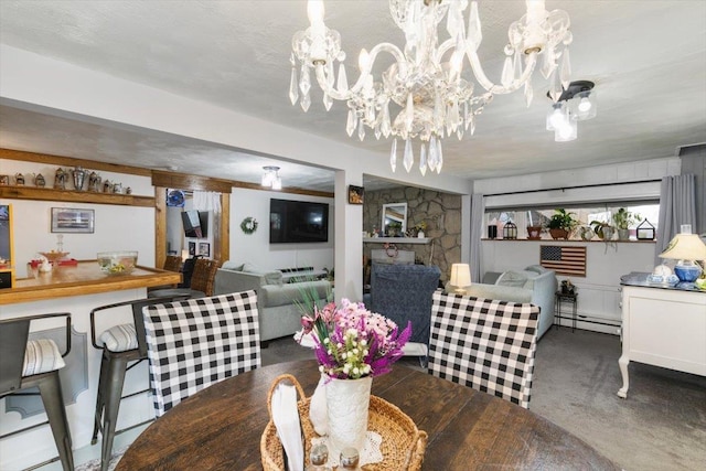 117A Chases Grove Rd, Derry, NH 03038 - dining space with a fireplace, a baseboard heating unit, and an inviting chandelier