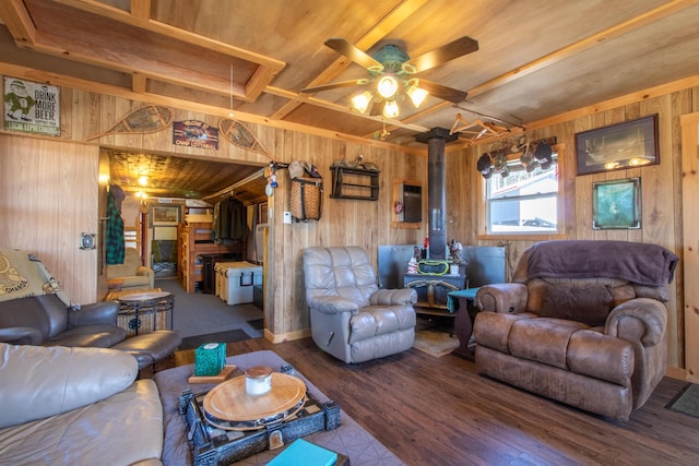 195 Curtis Rd, Morgan, VT 05853 - living room with a wood stove, wooden walls, ceiling fan, wood finished floors, and attic access