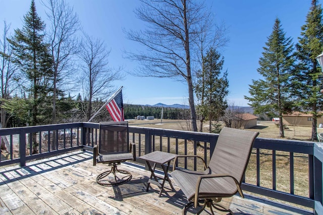 195 Curtis Rd, Morgan, VT 05853 - wooden deck with a mountain view