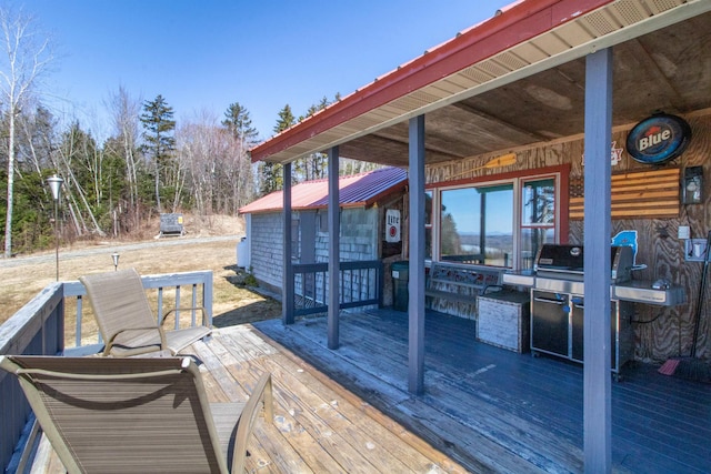 195 Curtis Rd, Morgan, VT 05853 - wooden terrace with area for grilling