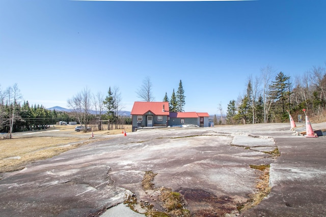 195 Curtis Rd, Morgan, VT 05853 - view of front of house featuring a metal roof and a mountain view