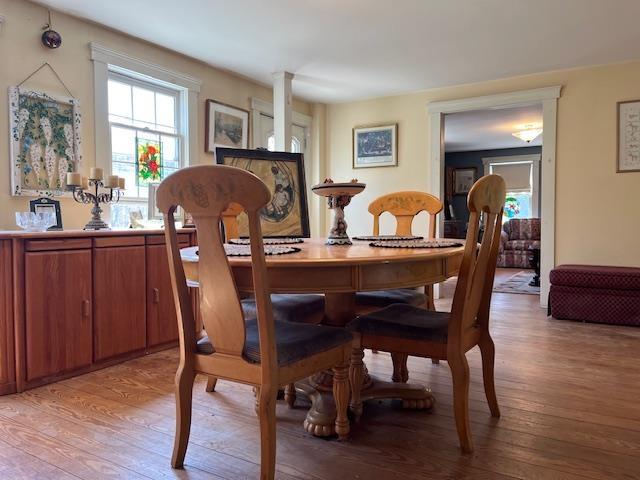 dining space featuring light wood-type flooring