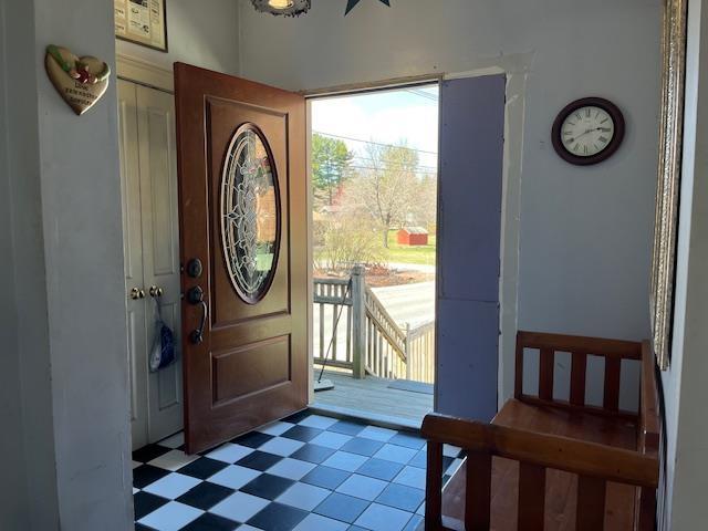 foyer featuring tile patterned floors