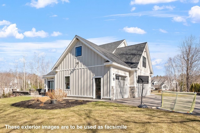 view of property exterior featuring a lawn, a garage, board and batten siding, driveway, and roof with shingles
