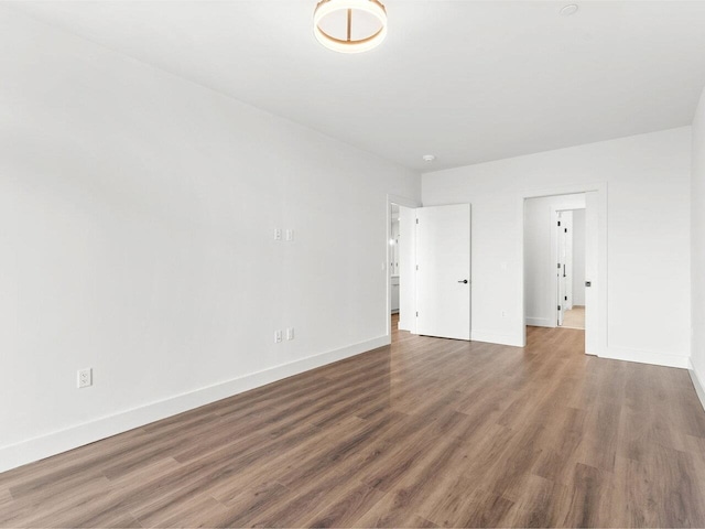 125 Cambrian Way Unit 605, Burlington, VT 05401 - unfurnished bedroom with wood finished floors and baseboards