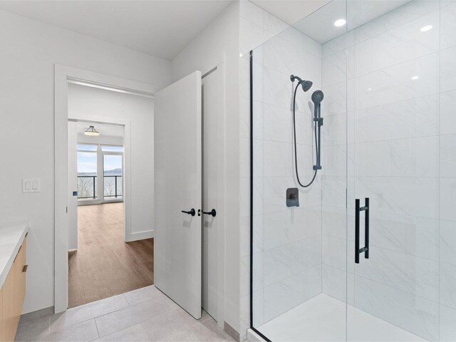 125 Cambrian Way Unit 605, Burlington, VT 05401 - bathroom with a shower stall and vanity