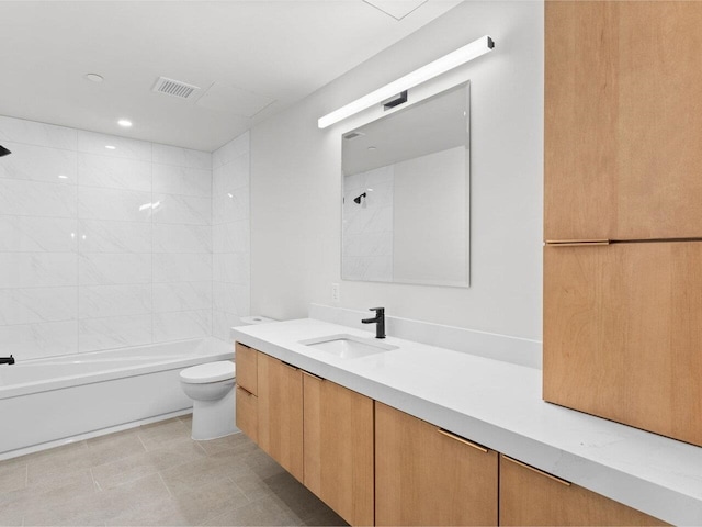 125 Cambrian Way Unit 605, Burlington, VT 05401 - bathroom with toilet, vanity, washtub / shower combination, and recessed lighting
