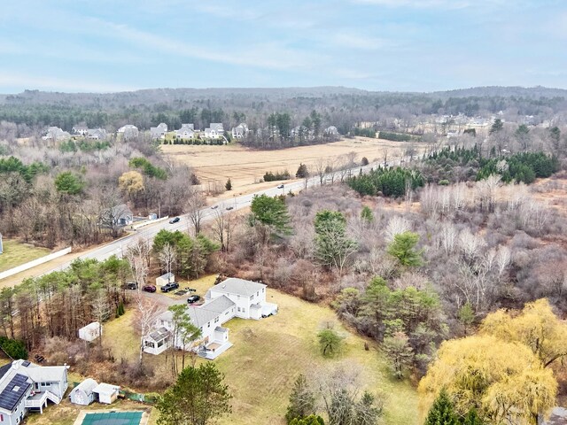 bird's eye view with a view of trees