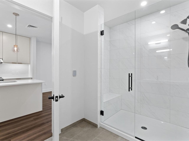 125 Cambrian Way Unit 611, Burlington, VT 05401 - full bathroom featuring vanity, a shower stall, and recessed lighting