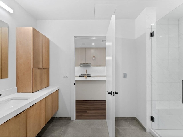 125 Cambrian Way Unit 611, Burlington, VT 05401 - bathroom featuring vanity and a stall shower