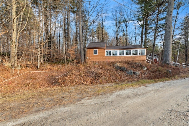 view of front of home with metal roof