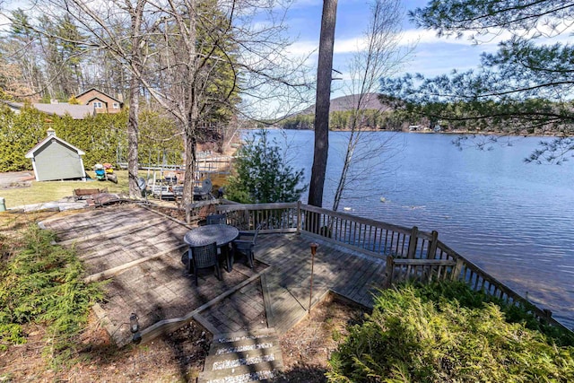 deck featuring a water view