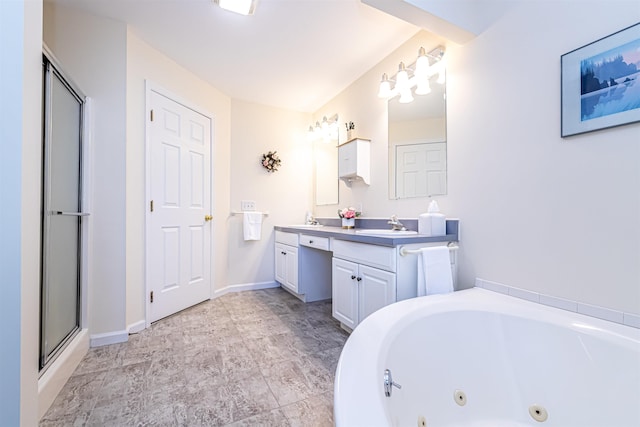 full bathroom with a sink, a shower stall, a jetted tub, and double vanity