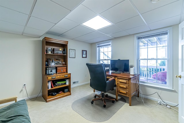 home office with baseboards, a drop ceiling, and carpet flooring