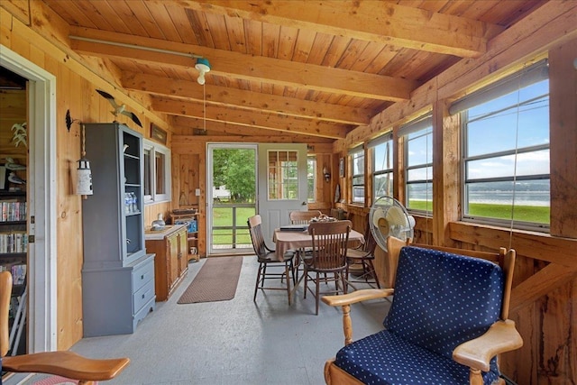 sunroom featuring beamed ceiling