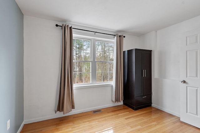 68 Barrington Ave, Nashua, NH 03062 - unfurnished room with visible vents, light wood-type flooring, and baseboards