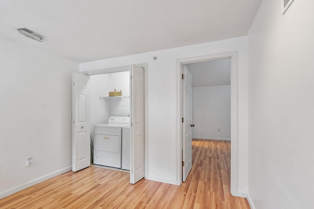 68 Barrington Ave, Nashua, NH 03062 - laundry room with separate washer and dryer, baseboards, light wood-style floors, visible vents, and laundry area