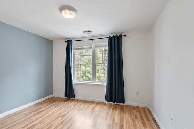 68 Barrington Ave, Nashua, NH 03062 - empty room featuring light wood-style flooring, baseboards, and visible vents