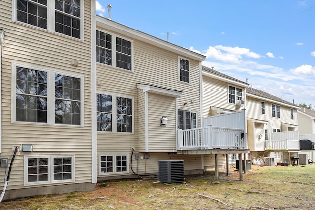68 Barrington Ave, Nashua, NH 03062 - rear view of house with a deck and central air condition unit