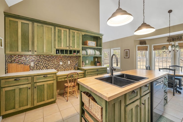23 Bear Hill Rd, Windham, NH 03087 - kitchen featuring green cabinetry, butcher block counters, light tile patterned floors, and high vaulted ceiling