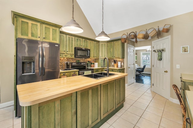 23 Bear Hill Rd, Windham, NH 03087 - kitchen featuring green cabinetry, black microwave, electric range oven, wood counters, and decorative backsplash