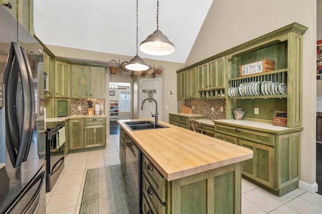23 Bear Hill Rd, Windham, NH 03087 - kitchen with green cabinetry, freestanding refrigerator, butcher block counters, light tile patterned flooring, and high vaulted ceiling