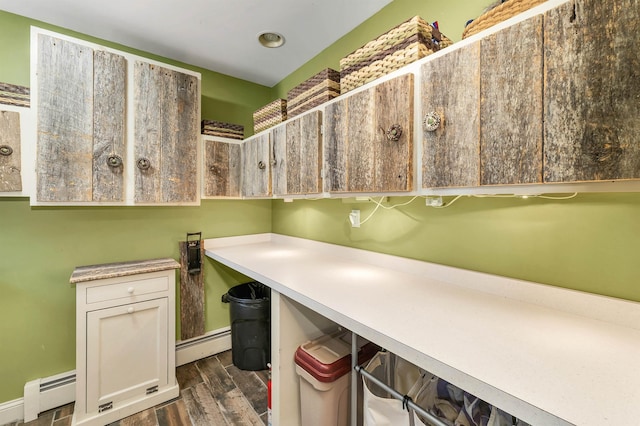 23 Bear Hill Rd, Windham, NH 03087 - laundry area with a baseboard heating unit and dark wood-style floors
