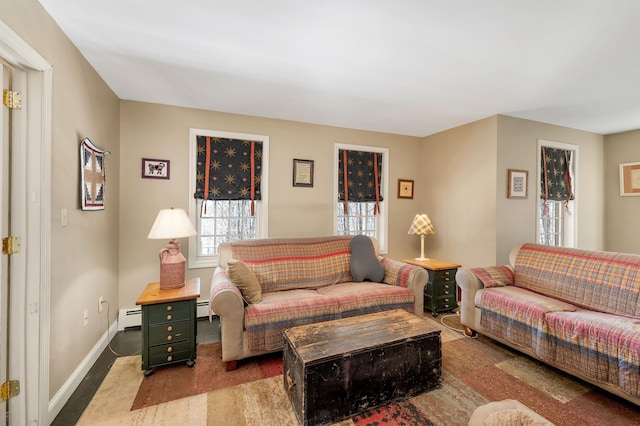 23 Bear Hill Rd, Windham, NH 03087 - living area with a baseboard heating unit and baseboards