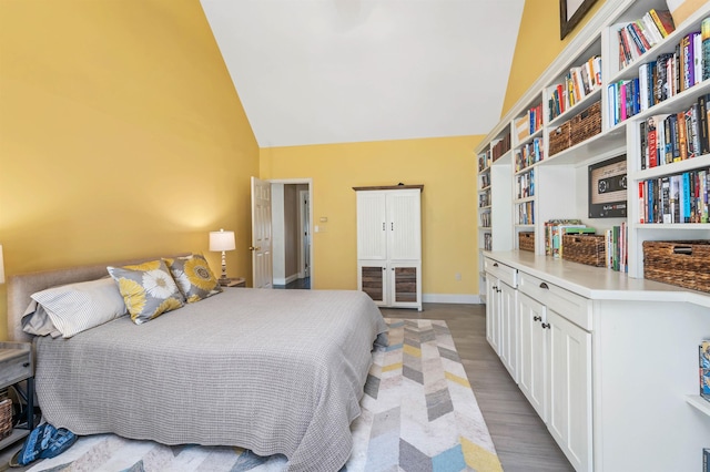23 Bear Hill Rd, Windham, NH 03087 - bedroom featuring high vaulted ceiling and wood finished floors