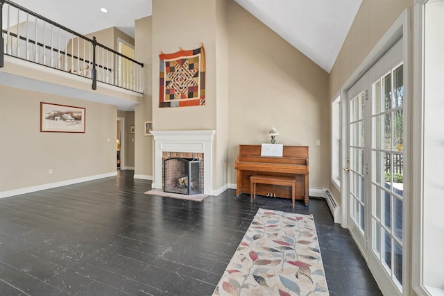 23 Bear Hill Rd, Windham, NH 03087 - living room with high vaulted ceiling, a brick fireplace, and wood finished floors