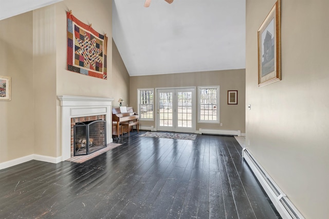 23 Bear Hill Rd, Windham, NH 03087 - living room with a baseboard radiator, baseboard heating, a brick fireplace, high vaulted ceiling, and wood-type flooring