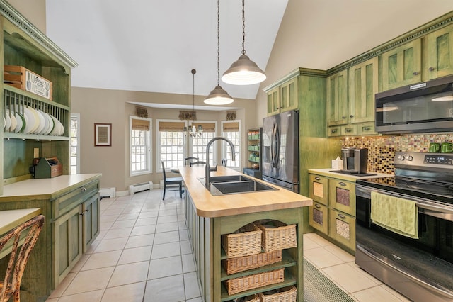 23 Bear Hill Rd, Windham, NH 03087 - kitchen with green cabinetry, stainless steel appliances, open shelves, butcher block countertops, and a baseboard radiator