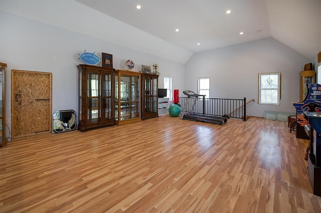 interior space with recessed lighting, light wood finished floors, and lofted ceiling