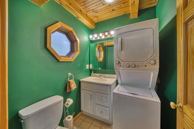 half bath featuring toilet, stacked washing maching and dryer, wood ceiling, vanity, and tile patterned flooring