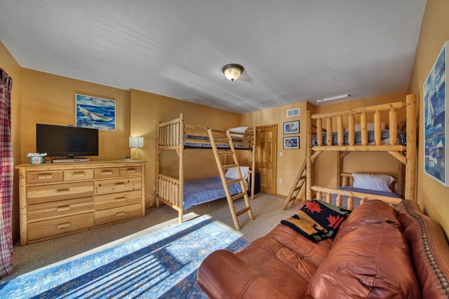 bedroom featuring visible vents and carpet floors