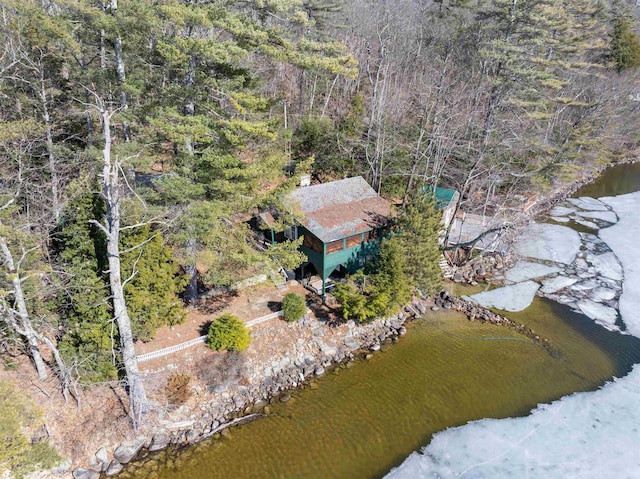 aerial view with a view of trees and a water view