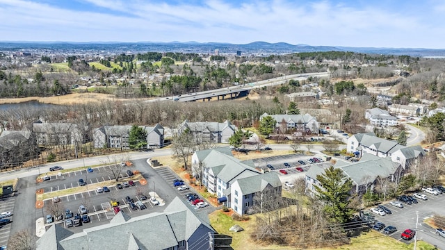 drone / aerial view featuring a mountain view