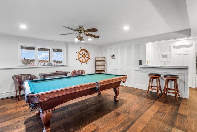 recreation room with a ceiling fan, billiards, and hardwood / wood-style flooring