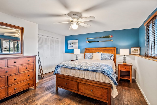 bedroom featuring a closet, ceiling fan, baseboards, and wood finished floors